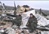 Пророссийские террористы позируют на фоне обломков сбитого Боинга